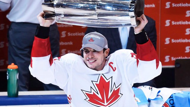 Team Canada captain Sidney Crosby lifting the 2016 World Cup of Hockey trophy. (Nathan Denette/The Canadian Press)